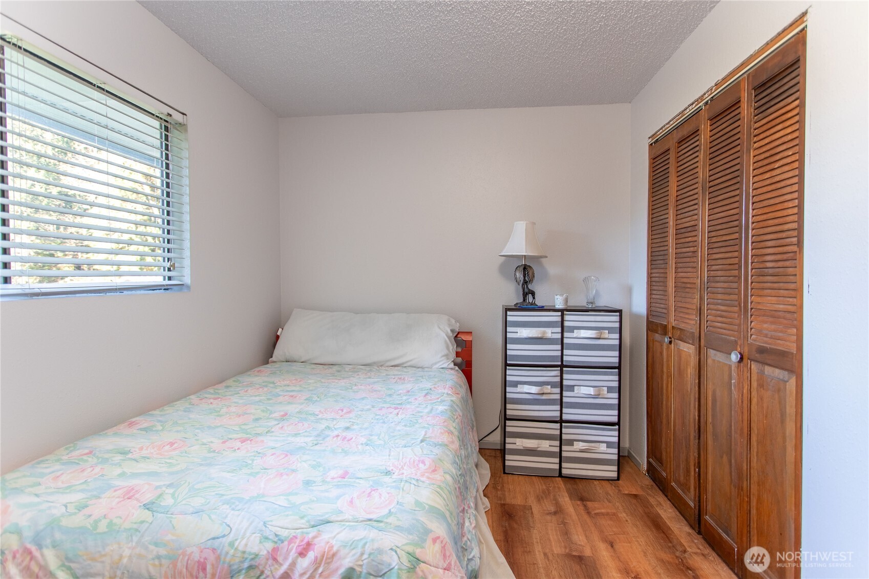 371 Pigeon Springs Road Onalaska, WA 98570 - Photo 15 of 39 a bedroom with a bed and a window