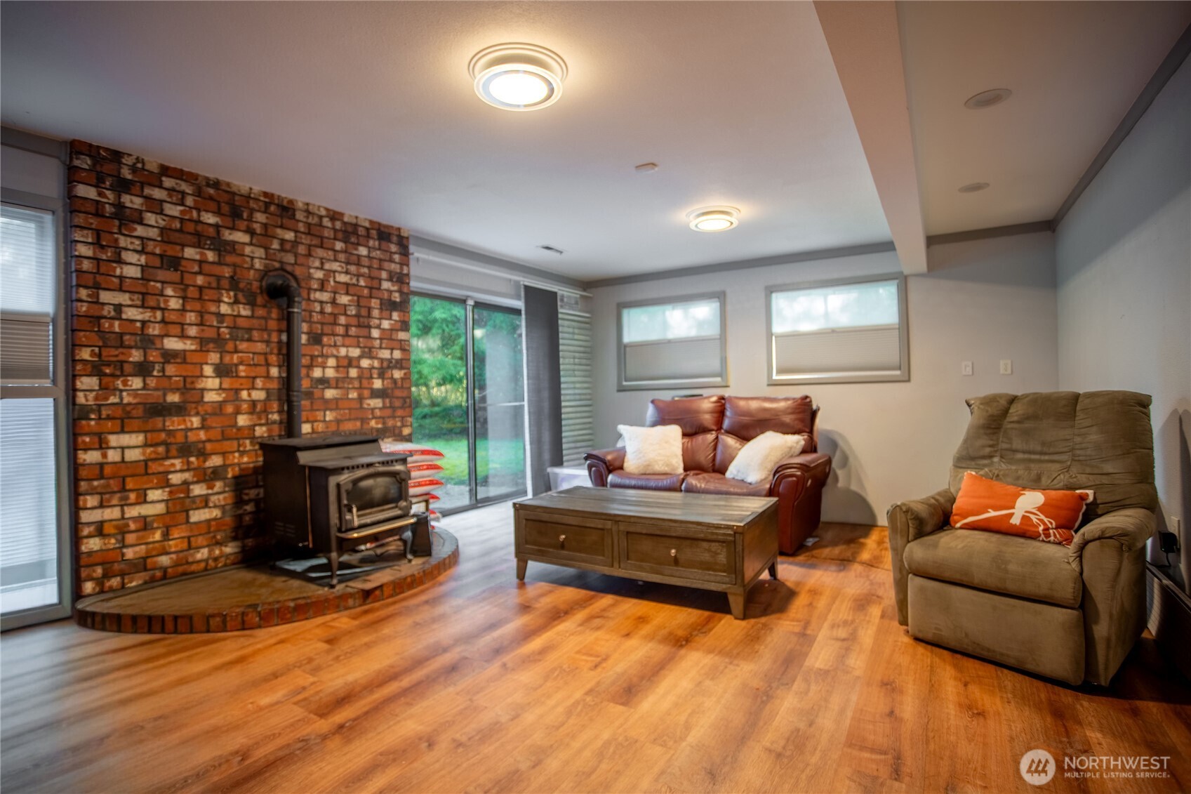 371 Pigeon Springs Road Onalaska, WA 98570 - Photo 16 of 39 a living room with furniture and a fireplace