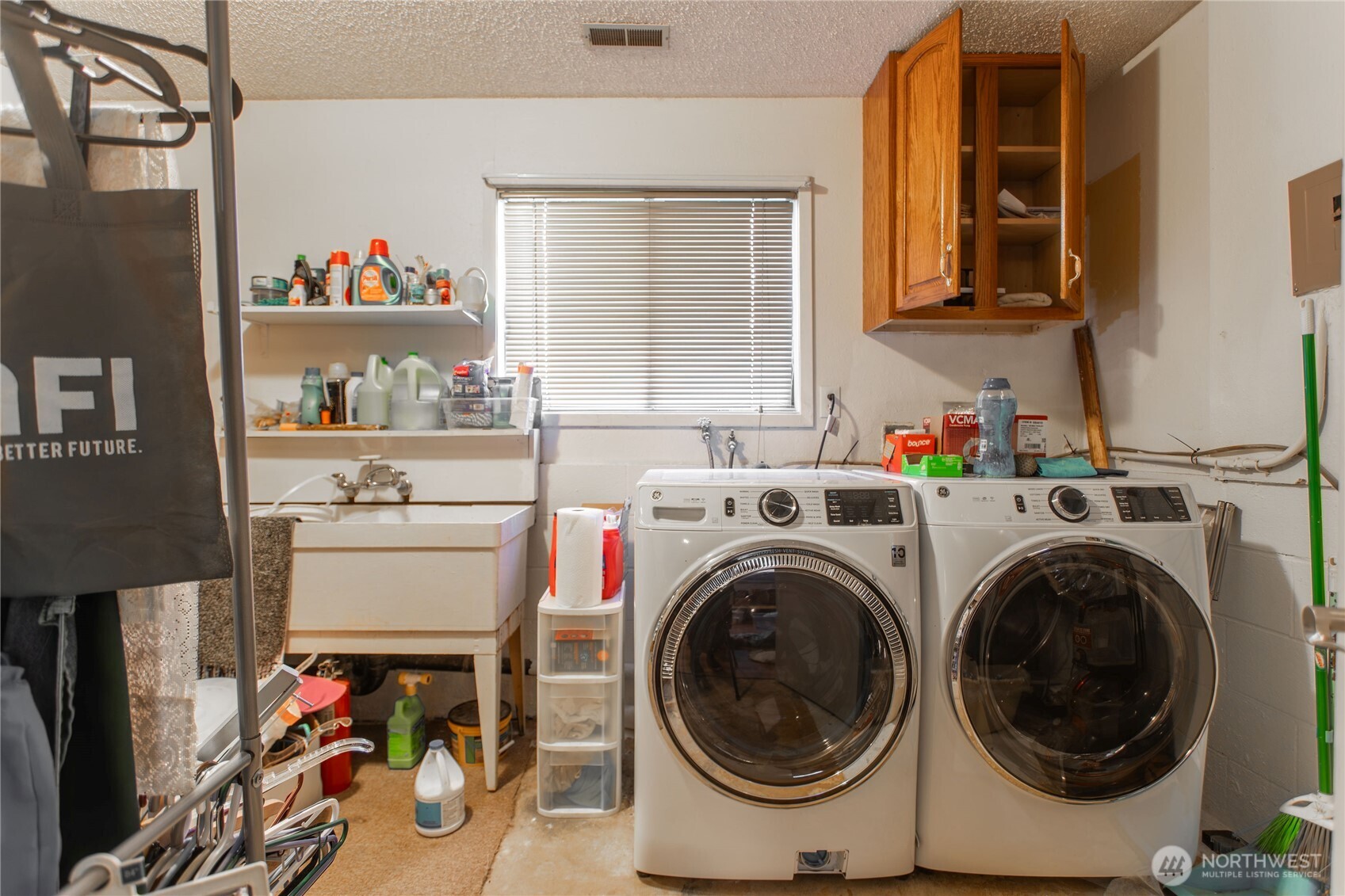 371 Pigeon Springs Road Onalaska, WA 98570 - Photo 18 of 39 a storage room with washer and dryer