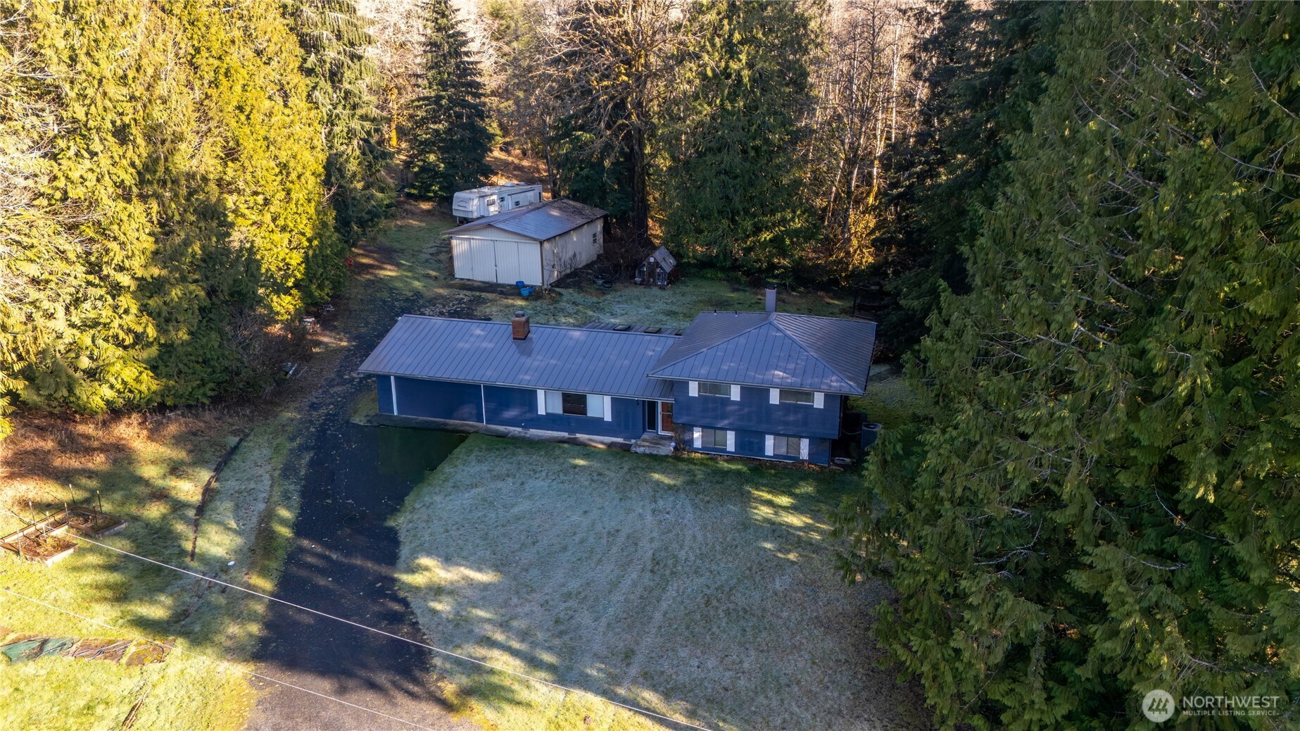 371 Pigeon Springs Road Onalaska, WA 98570 - Photo 4 of 39 an aerial view of a house with a yard large trees and a yard