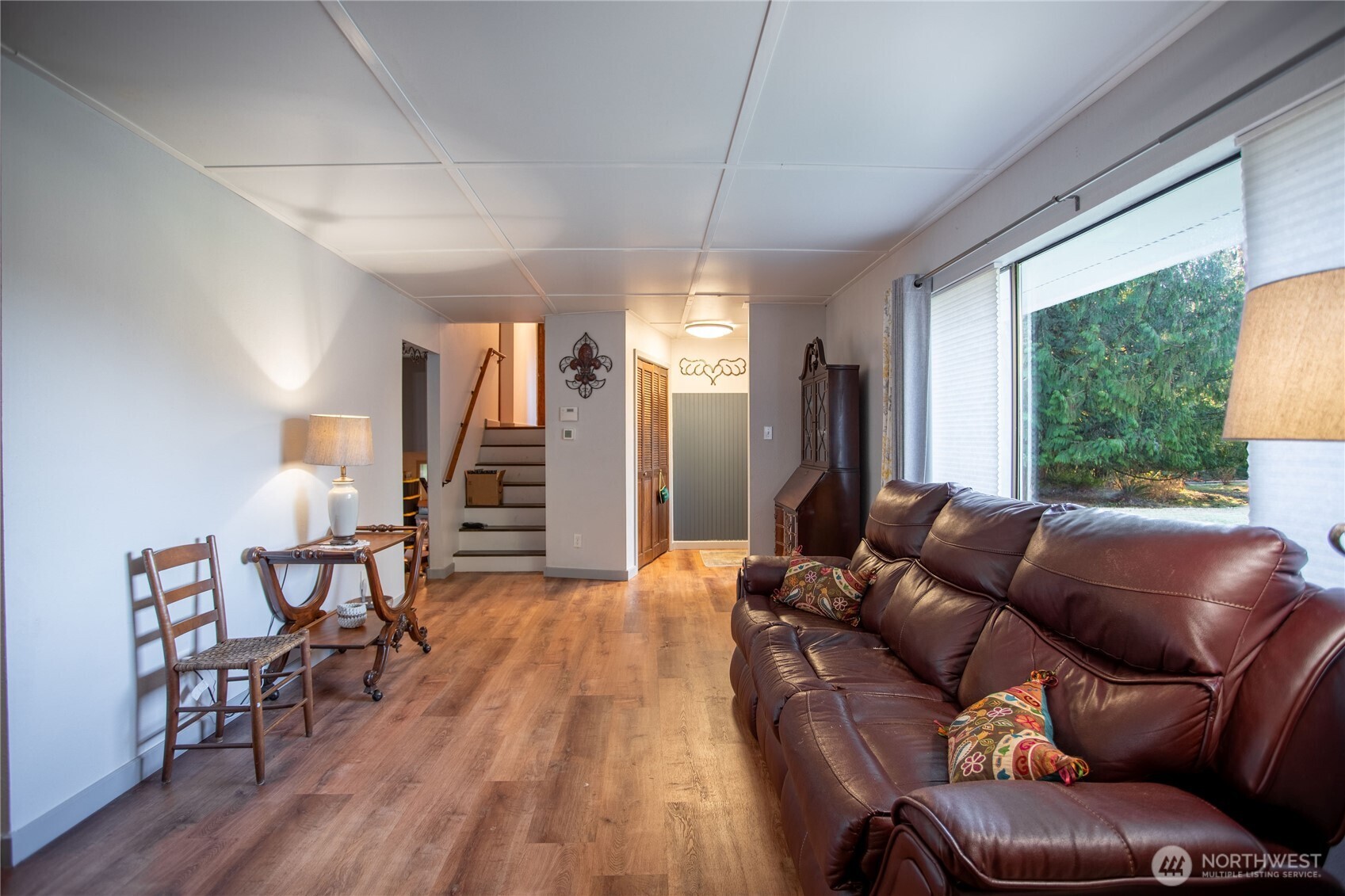 371 Pigeon Springs Road Onalaska, WA 98570 - Photo 7 of 39 a living room with furniture and a wooden floor