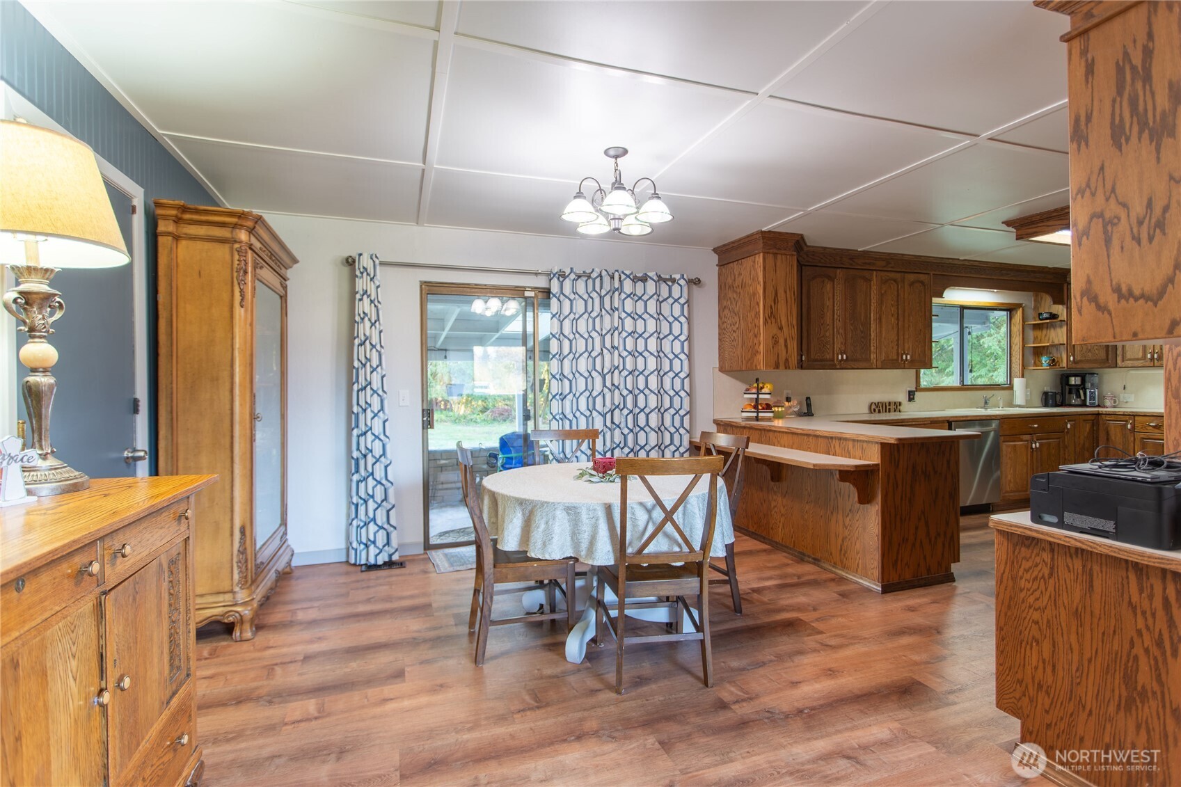 371 Pigeon Springs Road Onalaska, WA 98570 - Photo 8 of 39 a view of a dining room with furniture window and wooden floor