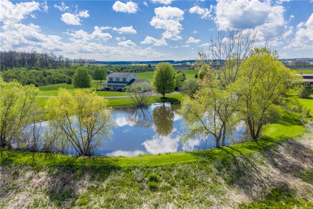 4128 River Road York, NY 14533 - Photo 2 of 50 SPECTACULAR COUNTRY ESTATE WITH PICTURESQUE POND &