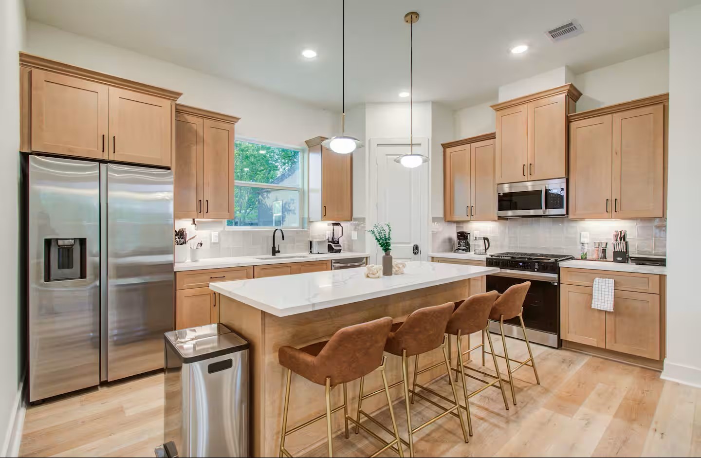 3311 Daphne Street Houston, TX 77021 - Photo 18 of 32 eaturing a sleek, modern design, this fully equipped kitchen has everything you need to whip up a tasty meal! The kitchen may be the heart of the home but you’re the heart of the kitchen!