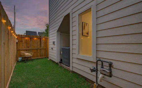 a view of a back yard of the house