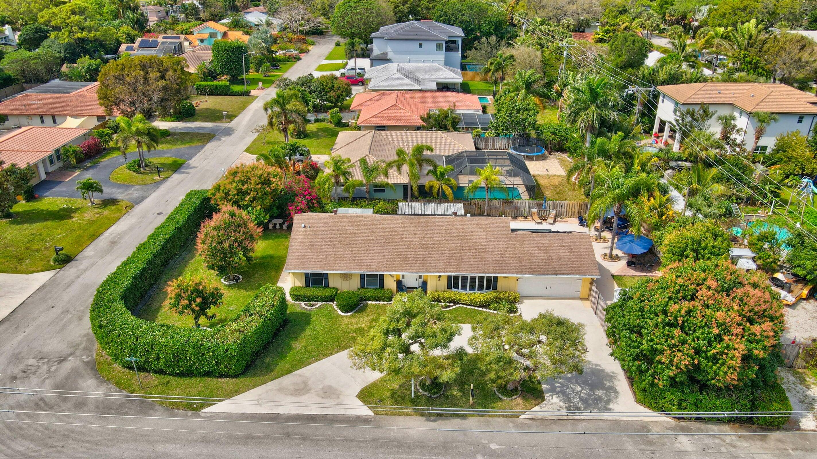 1599 Isabel Este Road Boca Raton, FL 33486 - Photo 1 of 22 an aerial view of a house