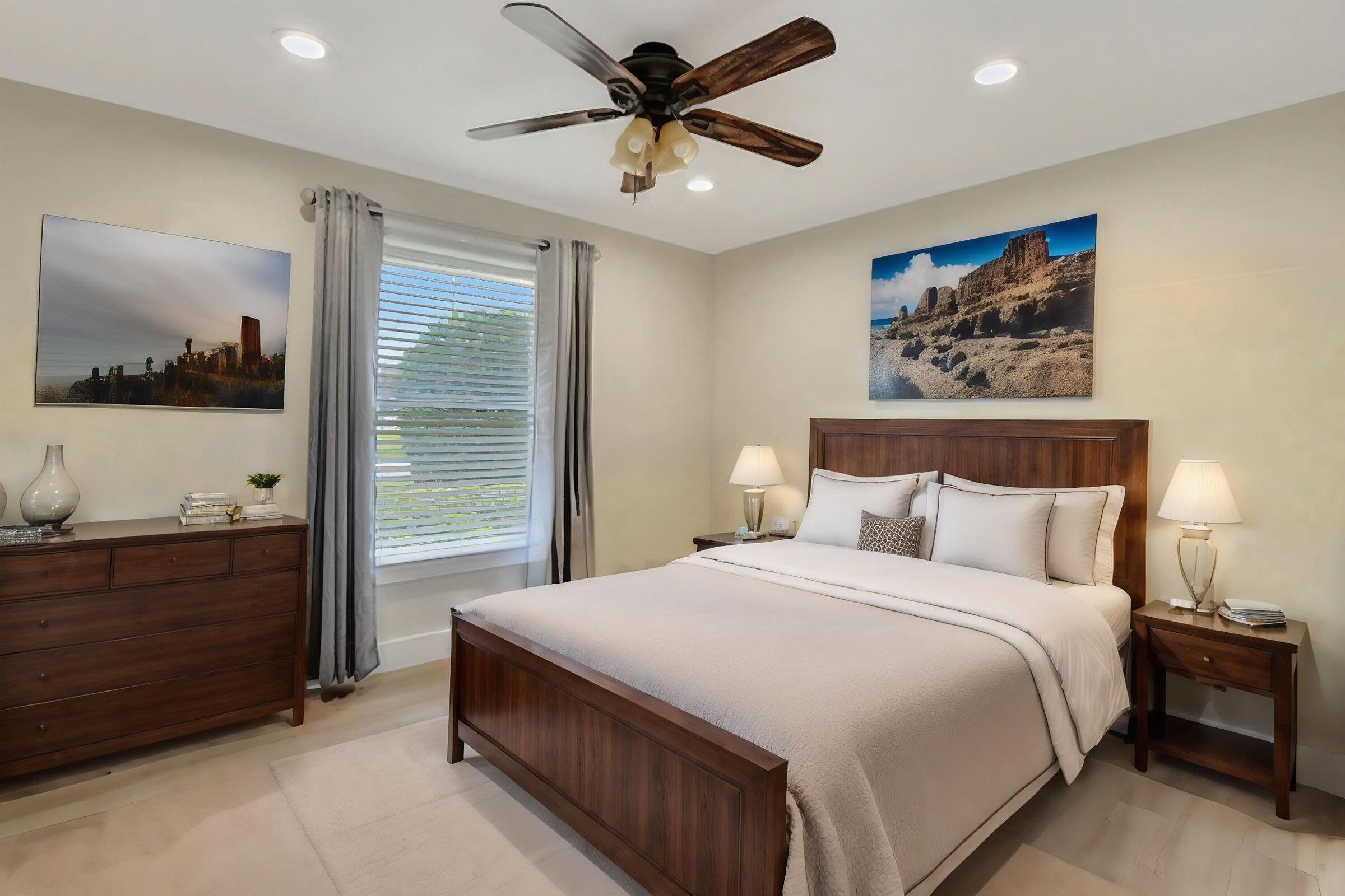 1599 Isabel Este Road Boca Raton, FL 33486 - Photo 15 of 22 a bedroom with a bed and a painting on the wall