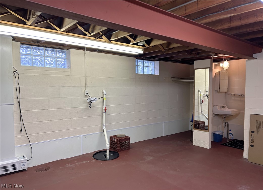 1748 Sunview Road Lyndhurst, OH 44124 - Photo 37 of 41 Recently painted, could be used as an Exercise Room or Work Room, includes a Full Bath. Glass block windows for additional privacy.
