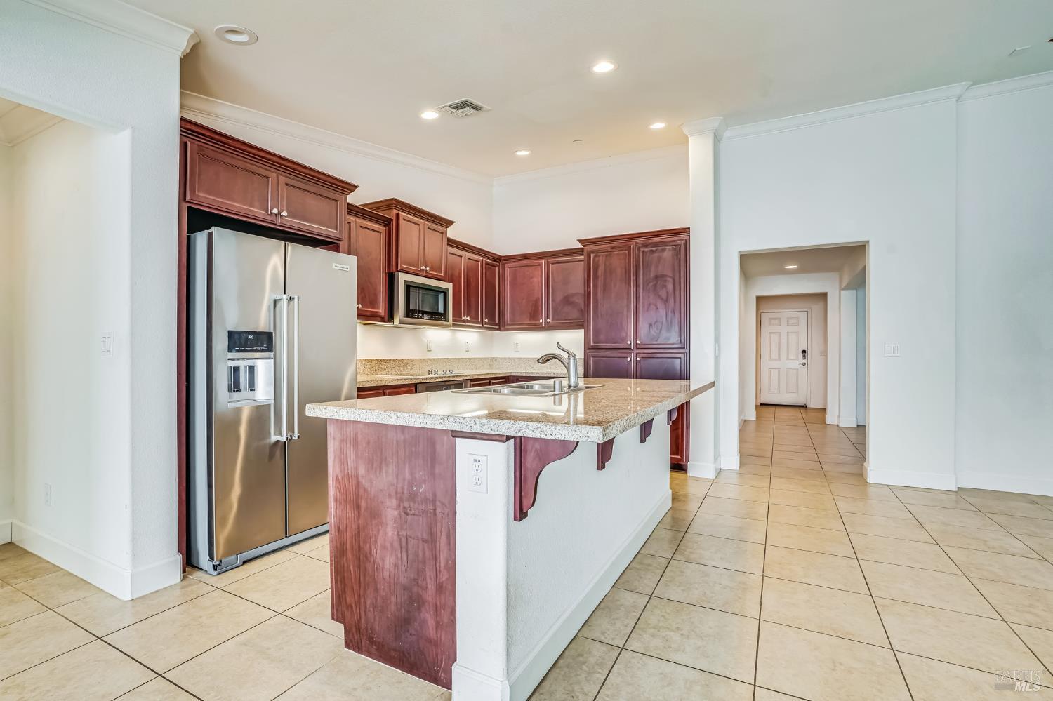 305 Birch Ridge Drive Rio Vista, CA 94571 - Photo 15 of 30 a kitchen with stainless steel appliances granite countertop a refrigerator and a sink
