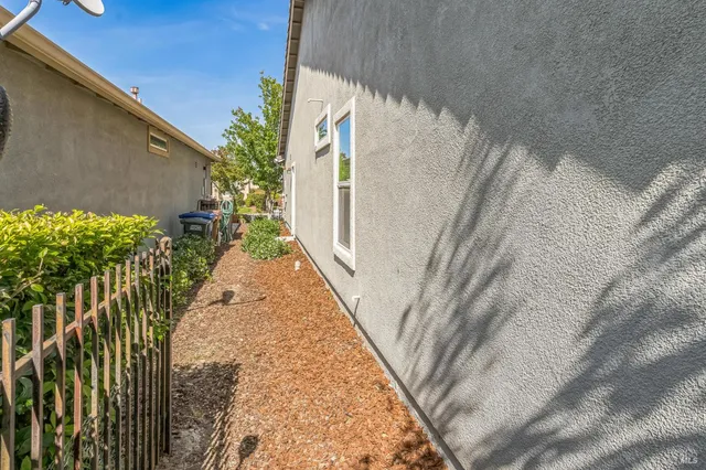 a view of balcony with wooden floor