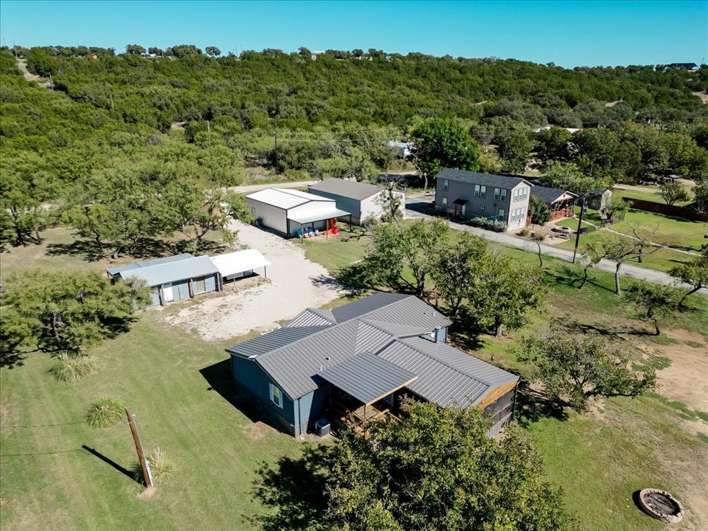 4441 Chapel Road Graham, TX 76450 - Photo 11 of 39 an aerial view of a house with mountain view