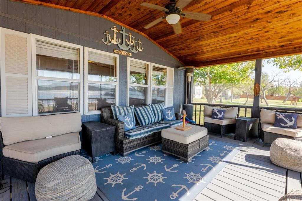 4441 Chapel Road Graham, TX 76450 - Photo 31 of 39 a living room with furniture and a large window