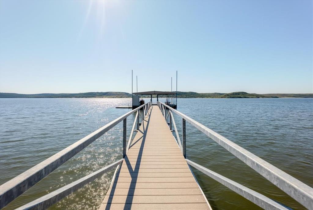 4441 Chapel Road Graham, TX 76450 - Photo 33 of 39 a view of wooden floor with a lake