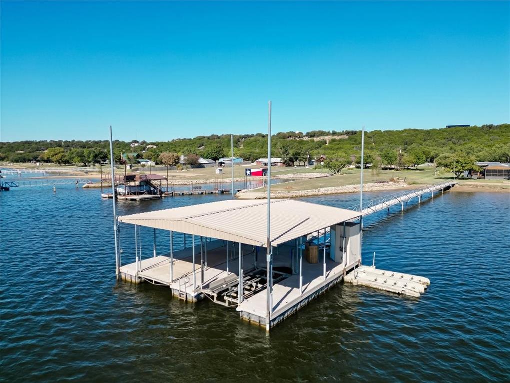 4441 Chapel Road Graham, TX 76450 - Photo 8 of 39 a view of a lake with a terrace