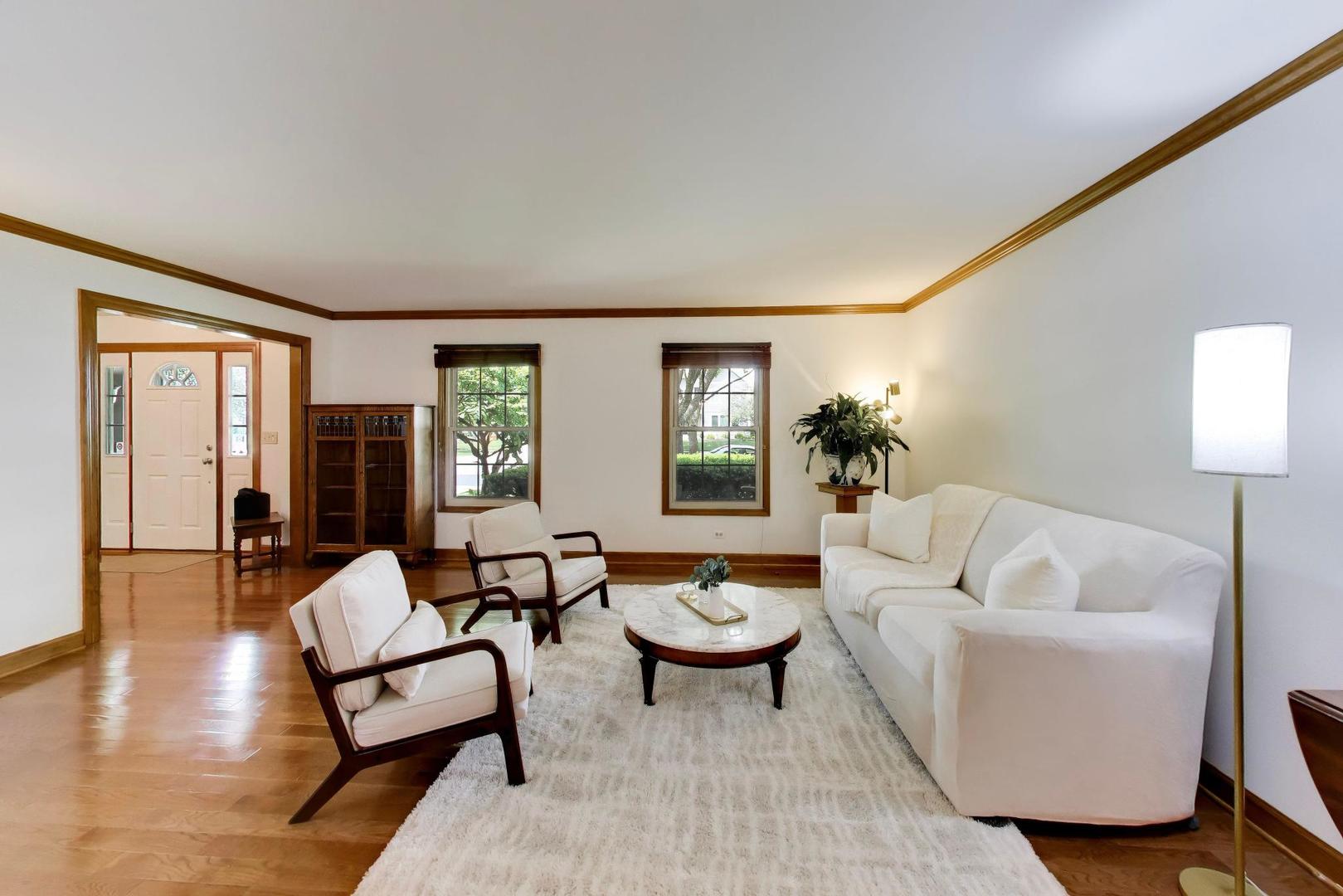 1528 Sequoia Road Naperville, IL 60540 - Photo 6 of 34 a living room with furniture and a potted plant