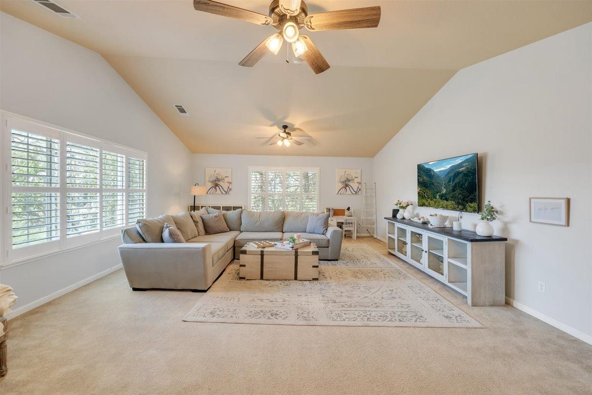 2441 Quail Hill Road Copperopolis, CA 95228 - Photo 14 of 91 A great room to host a crowd. Shutters for elegance and efficiency. Ceiling fans throughout plus central heat/A/C.