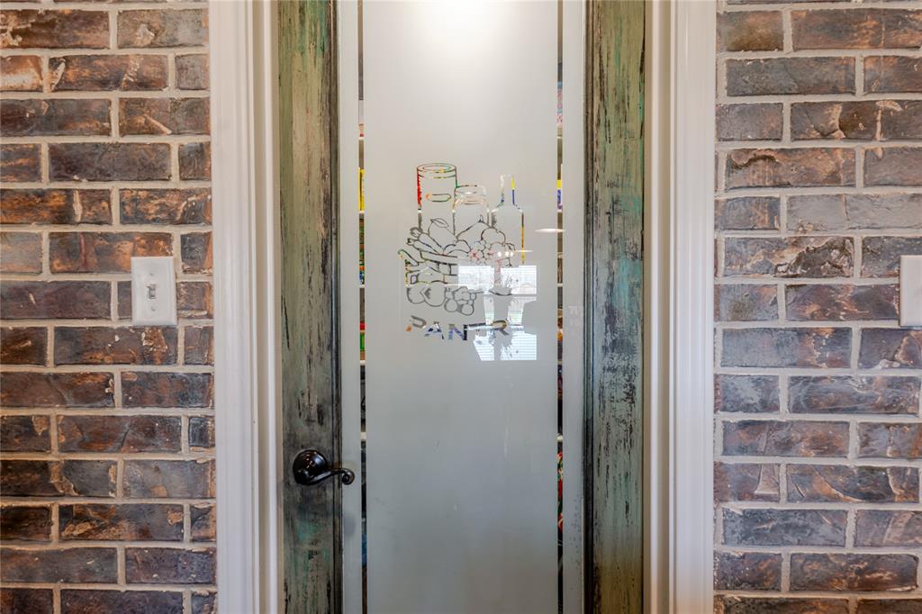 470 Wilson Bend Road Millsap, TX 76066 - Photo 14 of 39 a glass door with a glass door