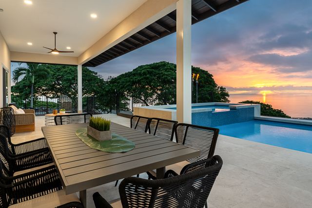 a view of a patio with swimming pool
