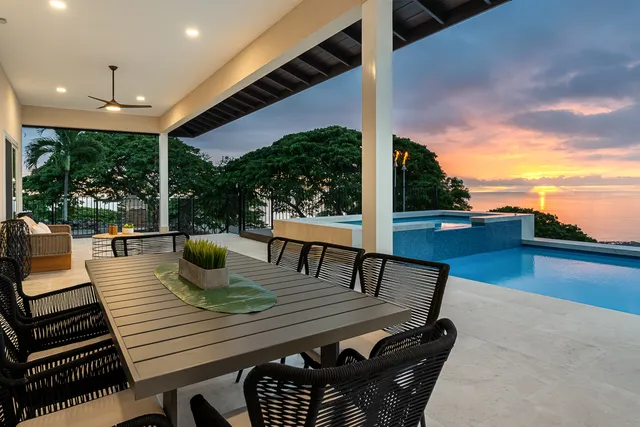 a view of a patio with swimming pool