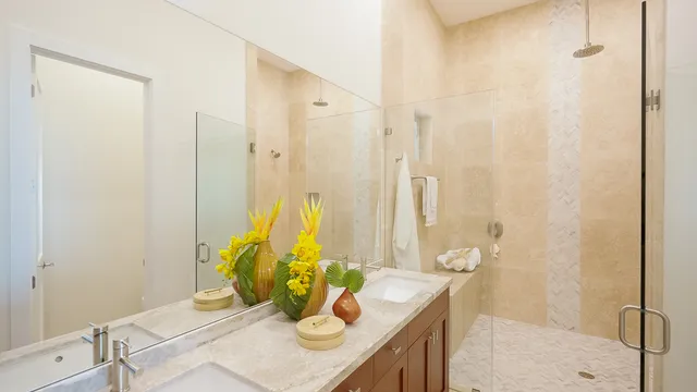 a view of bathroom with a tub shower and a sink