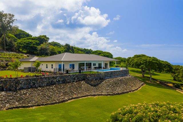 a view of a house with garden