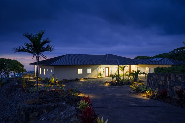 a view of a chairs and tables in patio