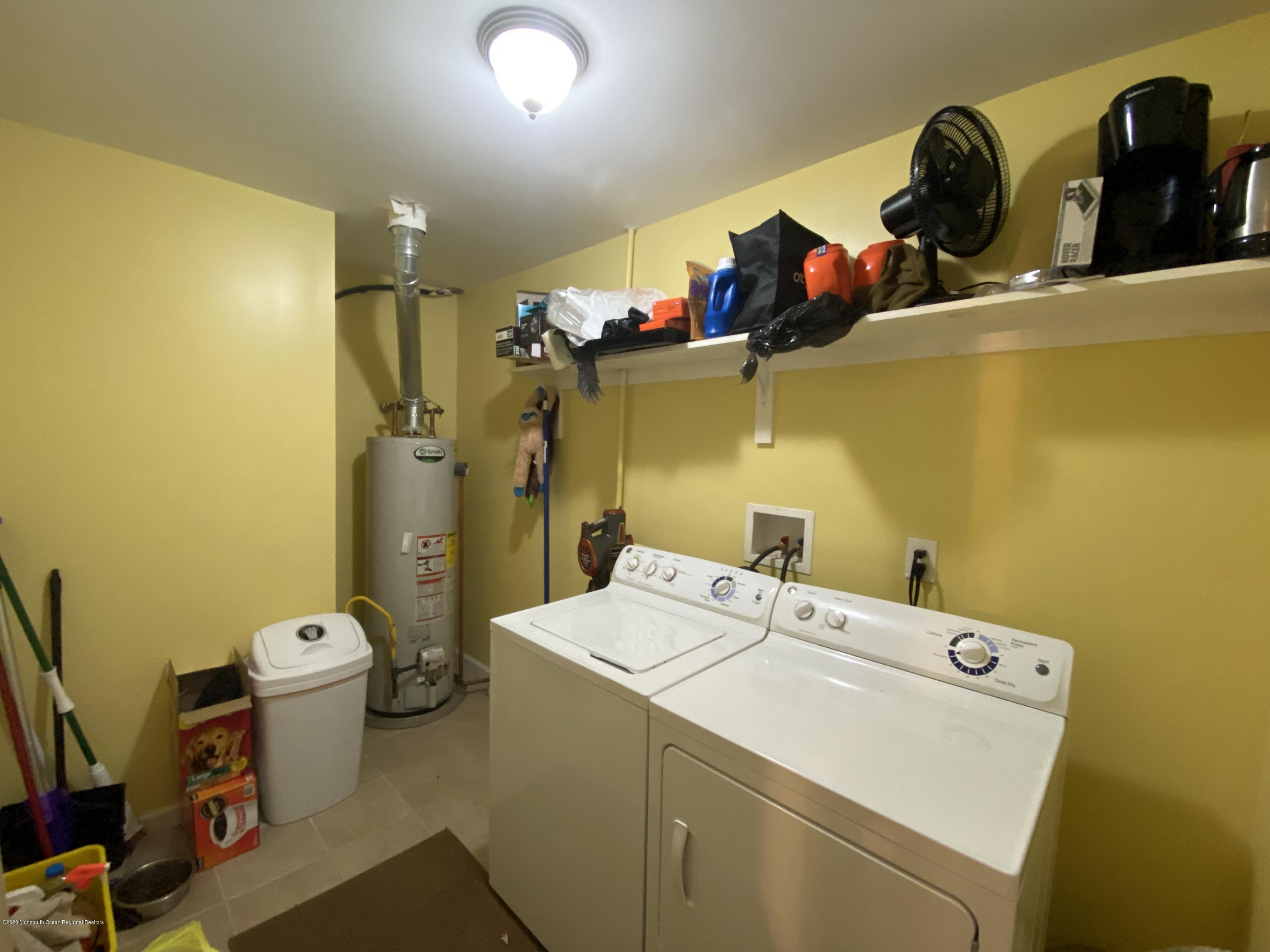 24 Cross Trees Road Brick, NJ 08723 - Photo 11 of 13 a utility room with dryer and washer