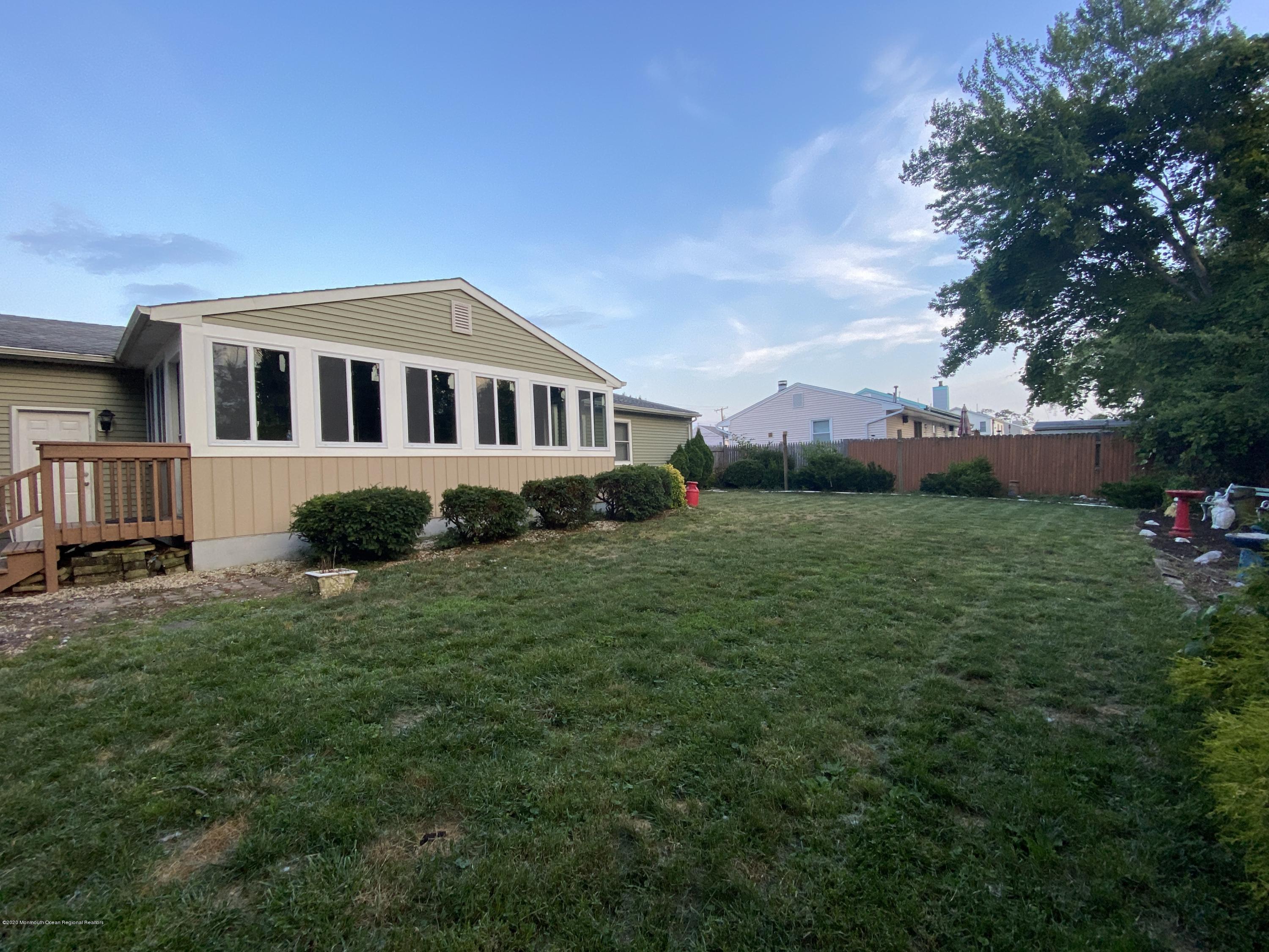 24 Cross Trees Road Brick, NJ 08723 - Photo 2 of 13 a house view with a garden space