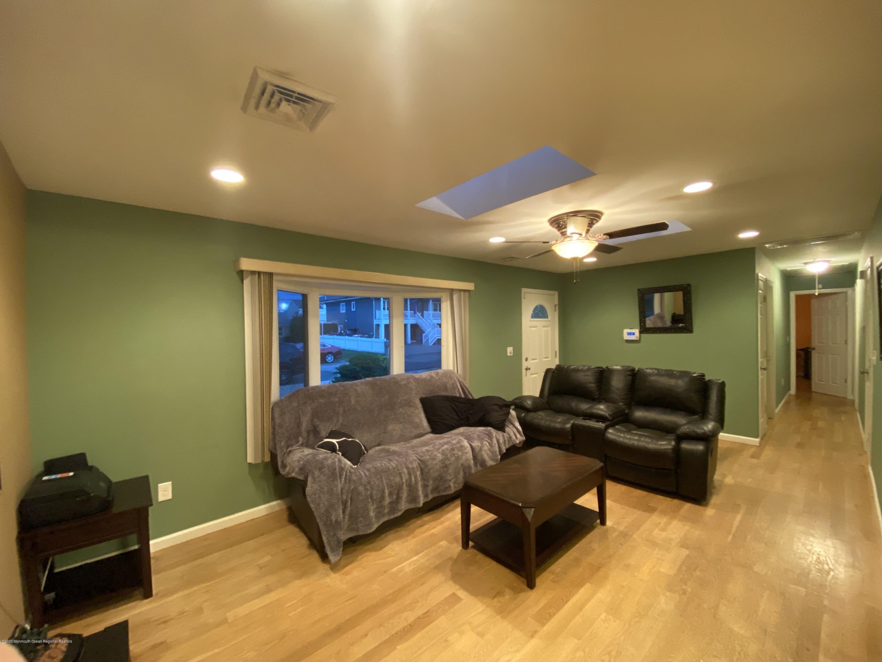 24 Cross Trees Road Brick, NJ 08723 - Photo 4 of 13 a living room with furniture and a potted plant