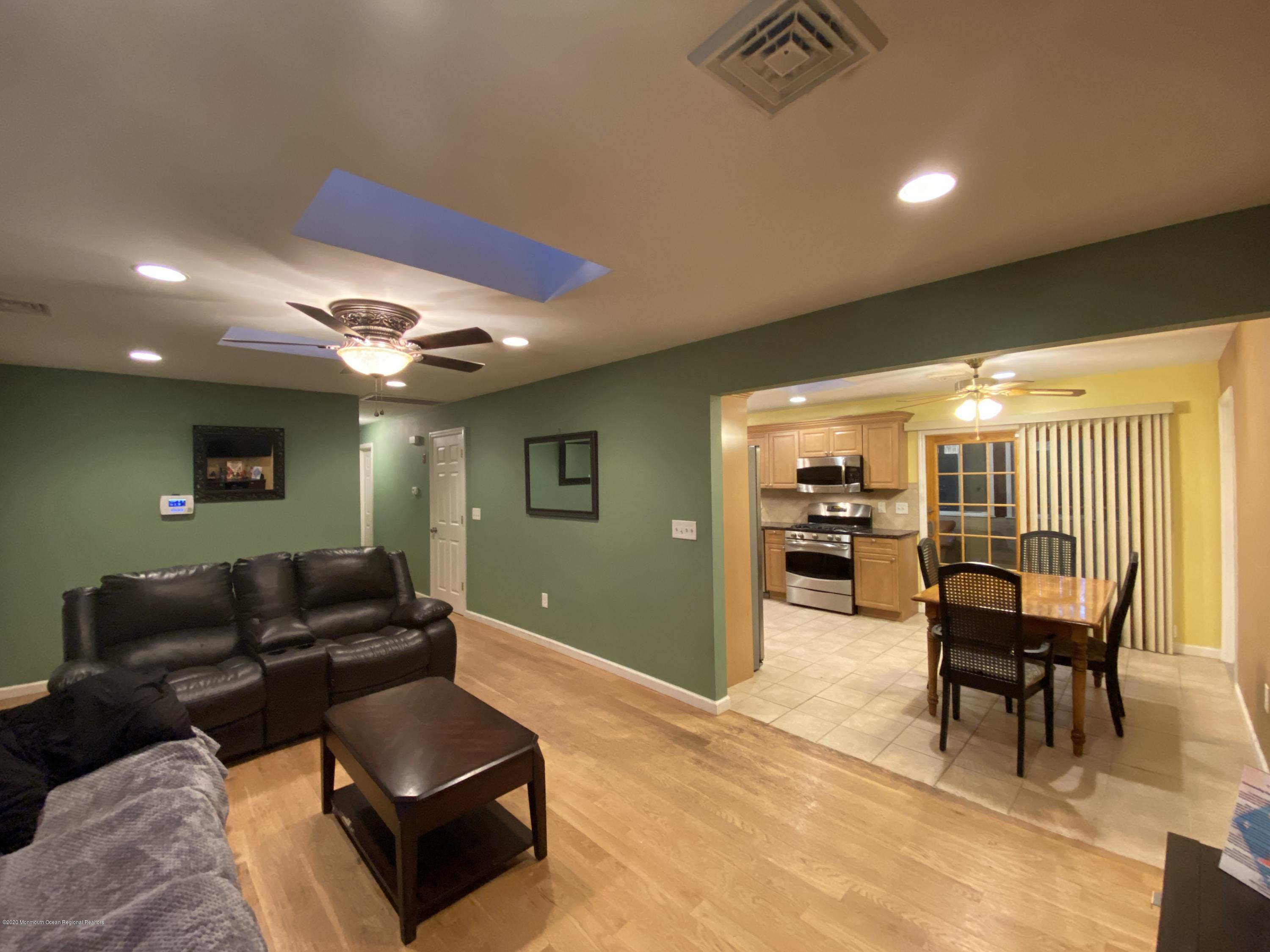 24 Cross Trees Road Brick, NJ 08723 - Photo 5 of 13 a living room with furniture and a large window