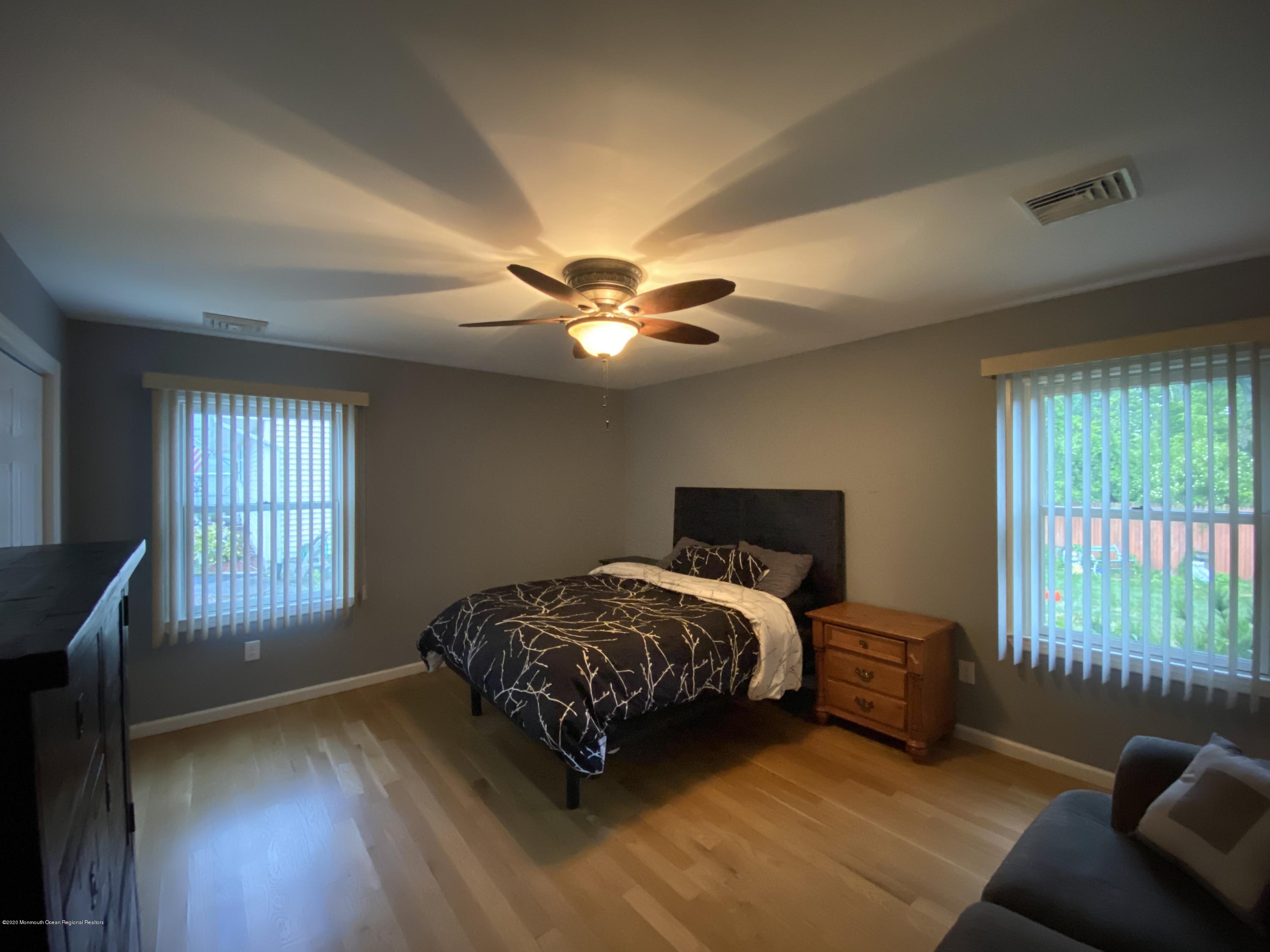 24 Cross Trees Road Brick, NJ 08723 - Photo 7 of 13 a bedroom with a bed and a window