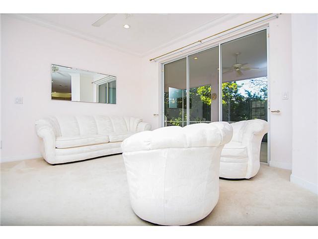 2677 Southwest Oak Ridge Road Palm City, FL 34990 - Photo 17 of 25 a living room with furniture and a potted plant