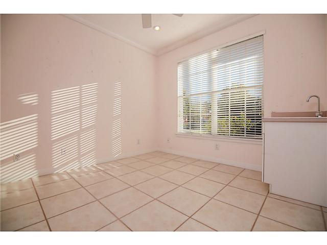 2677 Southwest Oak Ridge Road Palm City, FL 34990 - Photo 23 of 25 a view of an empty room with a window