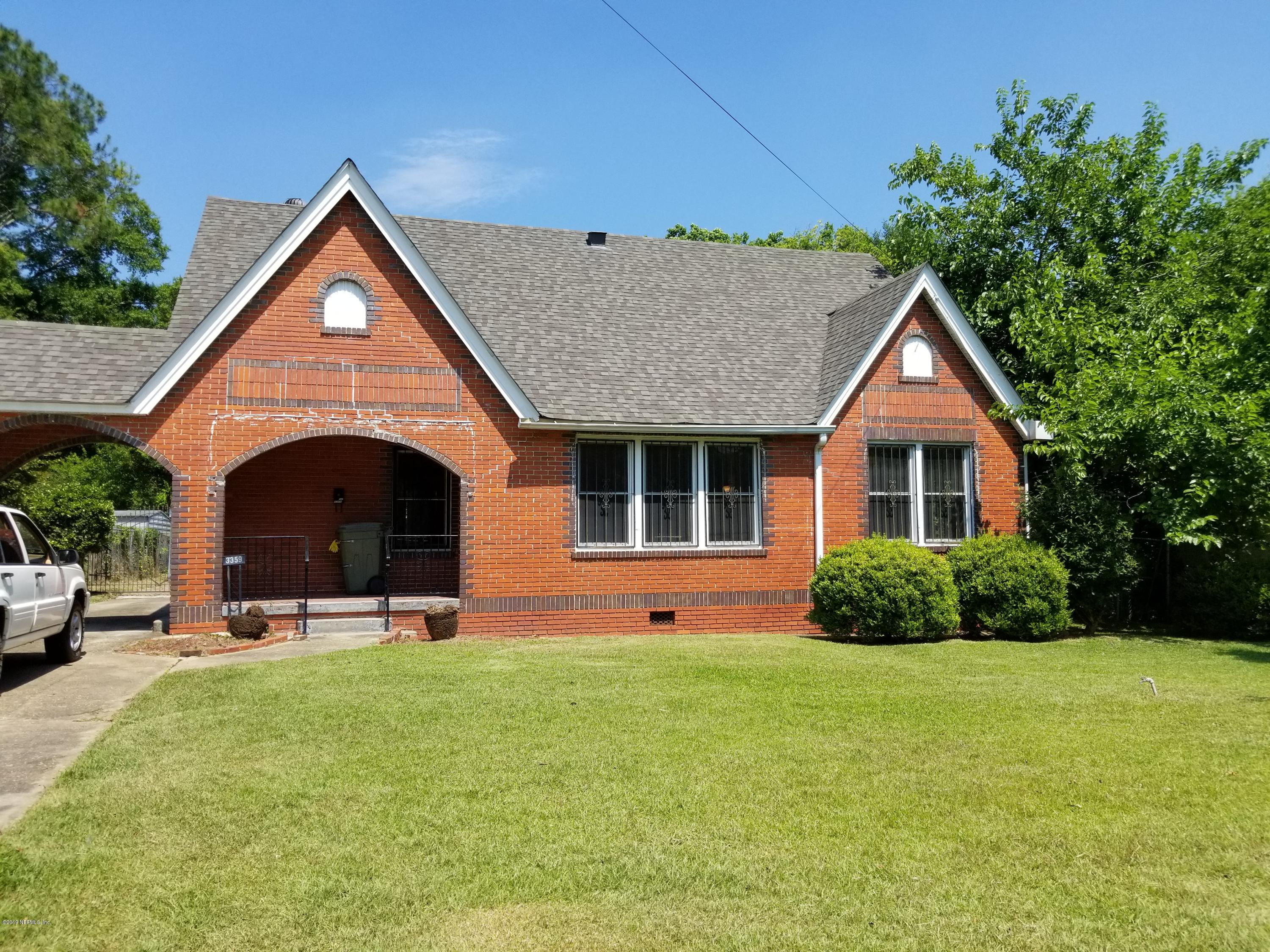 3359 Norman Bridge Road Montgomery, AL 36105 - Photo 1 of 10 a front view of a house with a yard