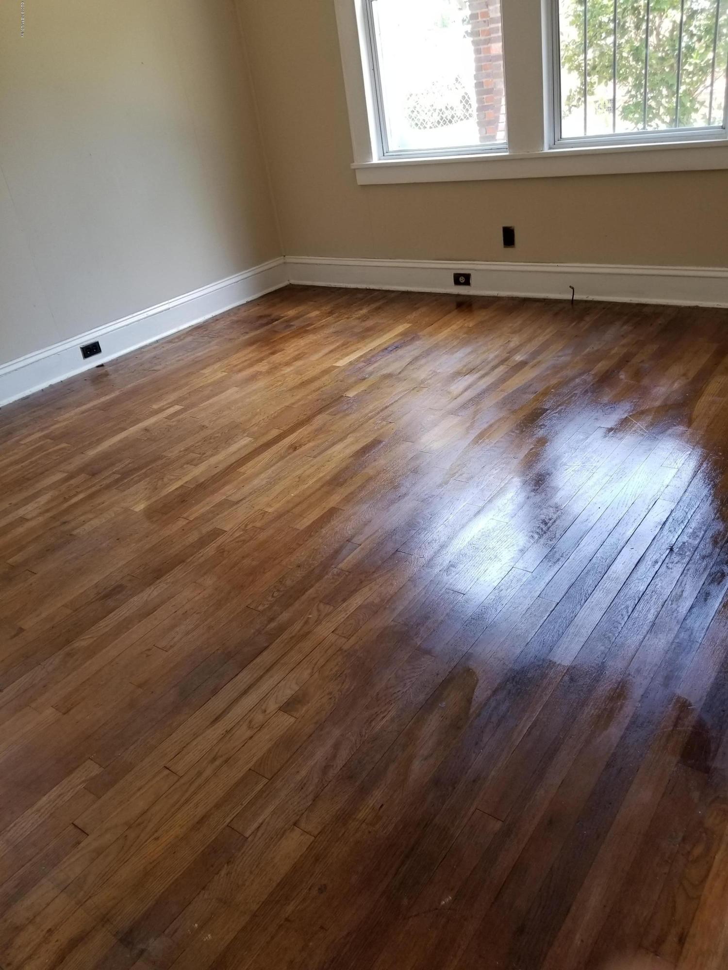 3359 Norman Bridge Road Montgomery, AL 36105 - Photo 8 of 10 a view of wooden floor and windows in a room