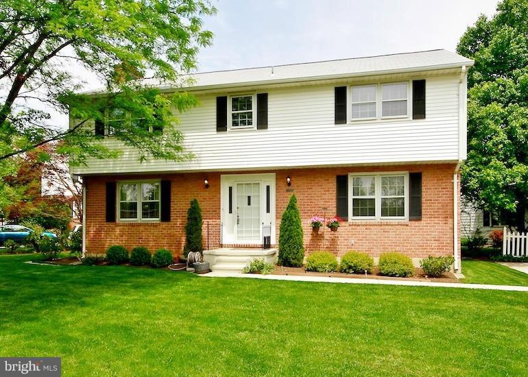 8200 Burnley Road Baltimore, MD 21204 - Photo 1 of 21 front view of a house with a yard