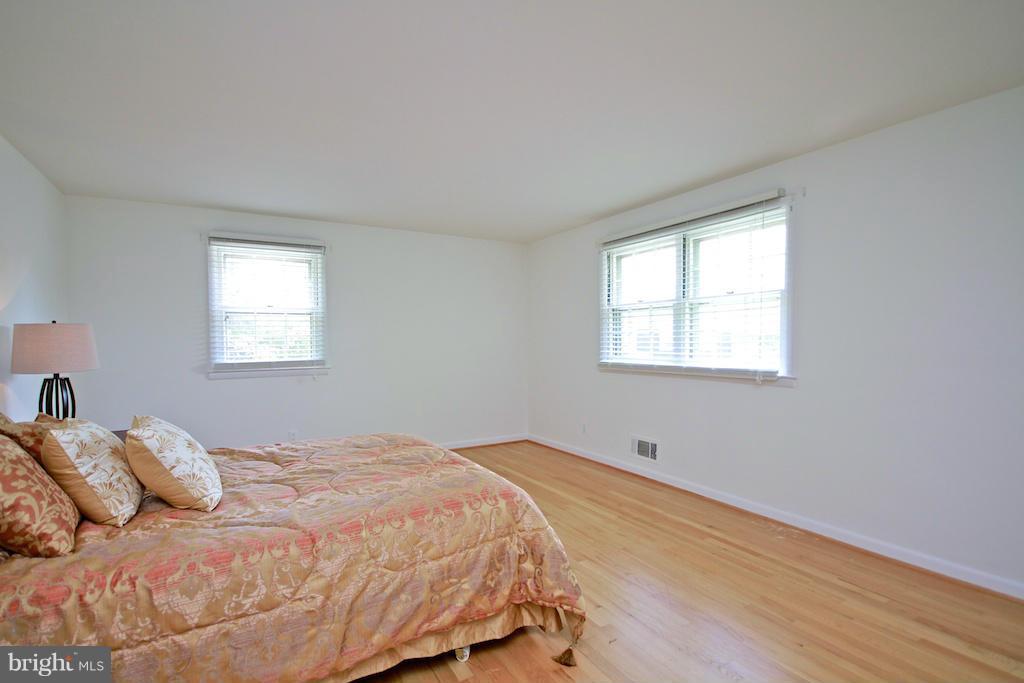 8200 Burnley Road Baltimore, MD 21204 - Photo 12 of 21 a bedroom with a bed and a window