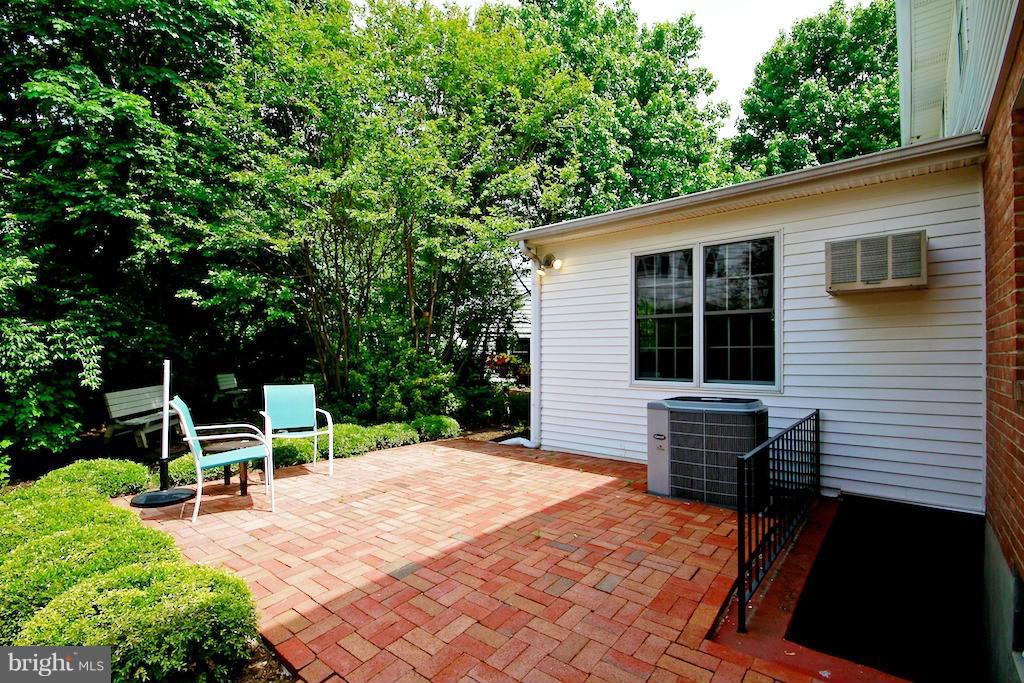 8200 Burnley Road Baltimore, MD 21204 - Photo 20 of 21 a backyard of a house with table and chairs