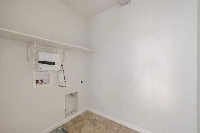 a view of a room with rack on the wall