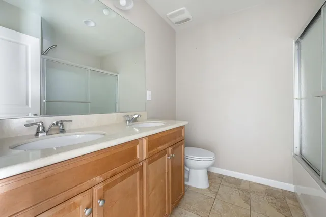 a bathroom with a sink and a toilet
