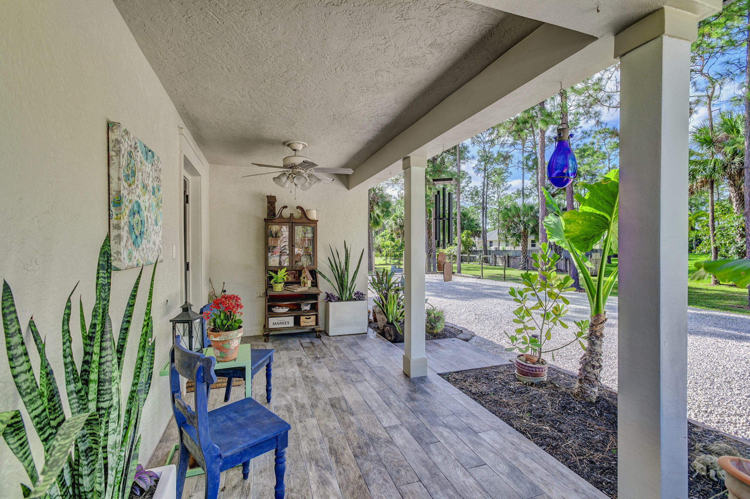 16368 93rd Road North Loxahatchee, FL 33470 - Photo 25 of 34 Covered Side Porch