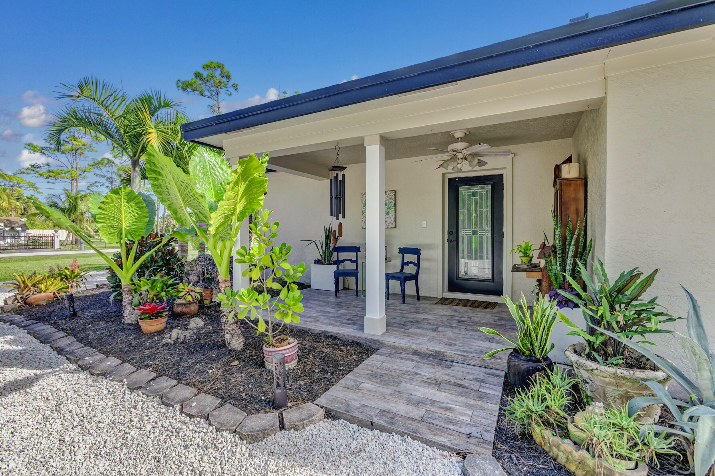 16368 93rd Road North Loxahatchee, FL 33470 - Photo 4 of 34 Hurricane Impact Door/Covered Porch