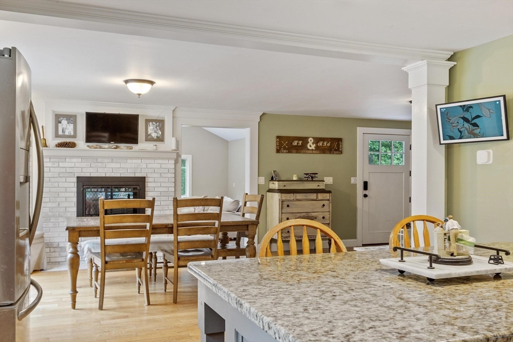 241 Reservoir Road Lunenburg, MA 01462 - Photo 25 of 40 a living room with furniture and flat screen tv