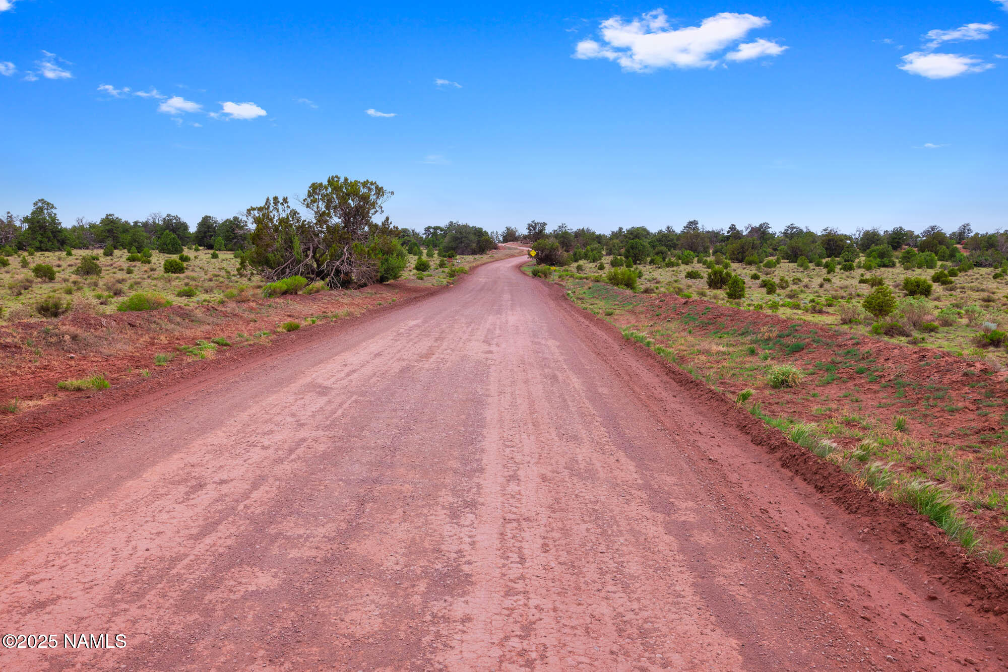 8449 Water Tank Circle, Unit A Williams, AZ 86046 - Photo 17 of 56 a view of a road with an ocean view