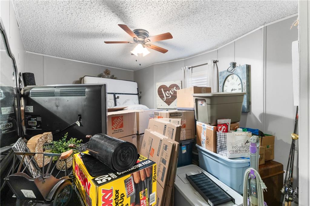224 Hebron Road Commerce, GA 30530 - Photo 17 of 25 a bedroom with furniture and a window
