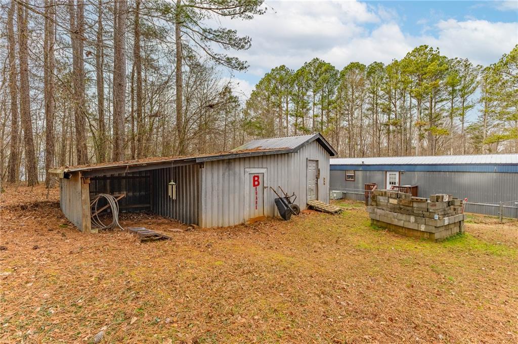224 Hebron Road Commerce, GA 30530 - Photo 22 of 25 a view of house with outdoor seating