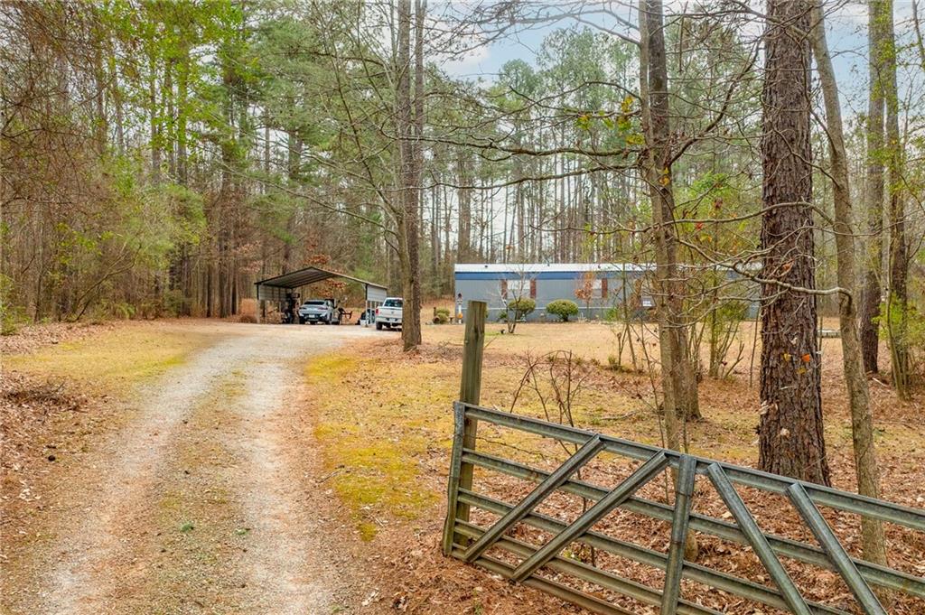 224 Hebron Road Commerce, GA 30530 - Photo 23 of 25 a view of a yard with wooden fence