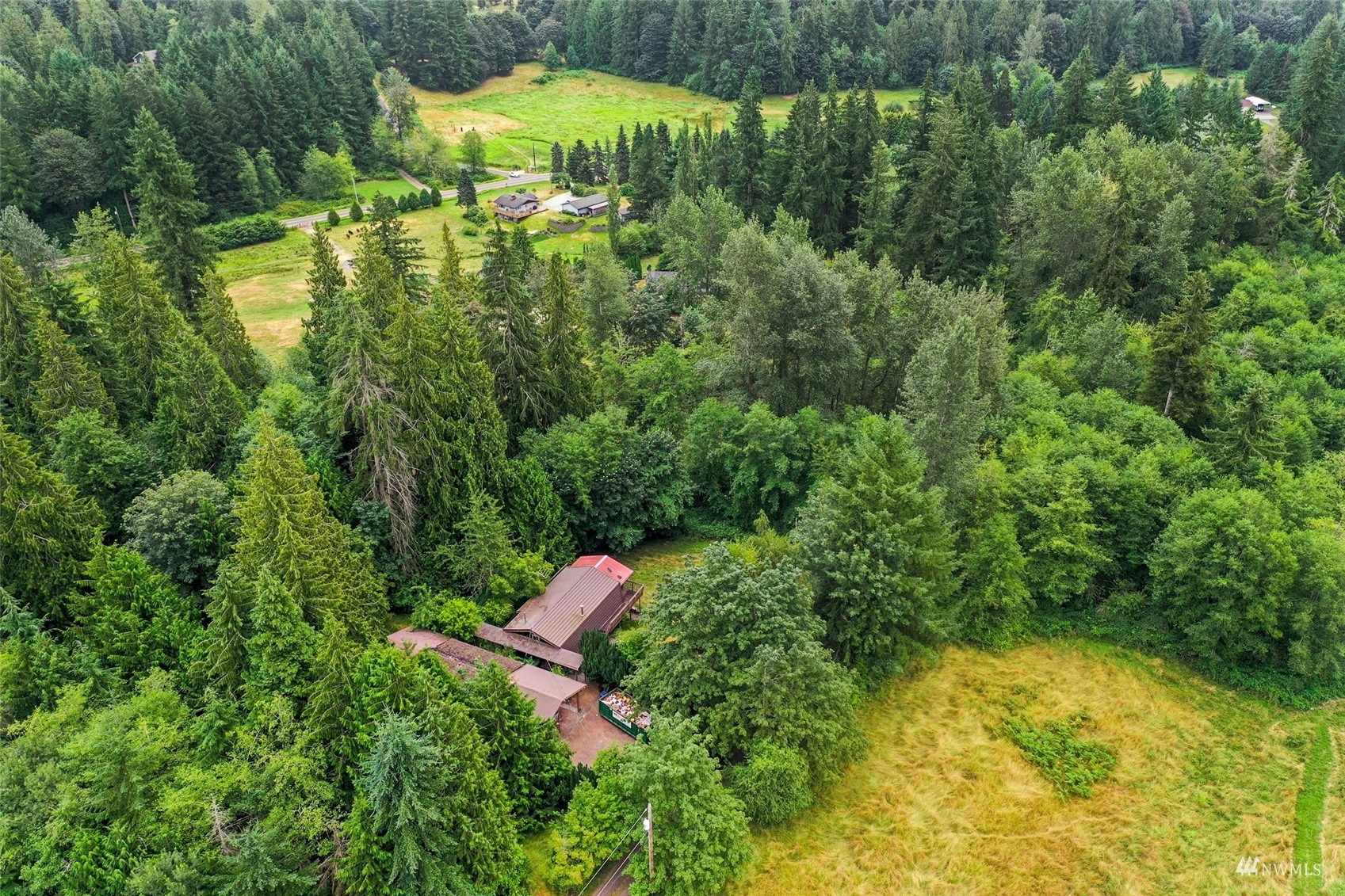 18120 Butler Road Snohomish, WA 98290 - Photo 38 of 39 a view of a lake with a yard