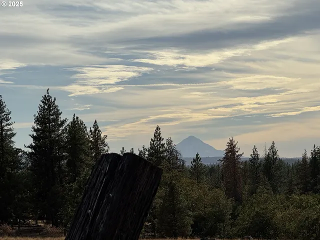 a view of a snow yard and mountain