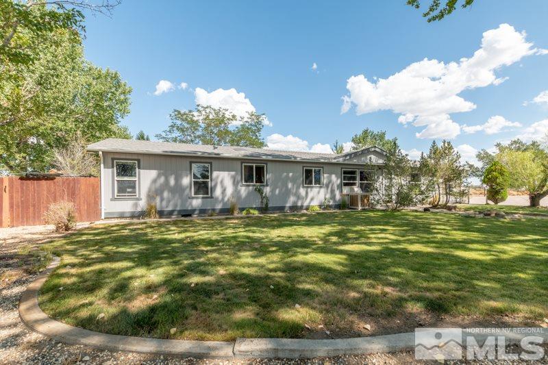 4989 Cody Road Fallon, NV 89406 - Photo 2 of 39 a view of a house with a yard